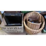 A typewriter, wooden crate, baskets etc