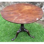 A 19th century mahogany circular tripod table, with bird cage action, diameter 34ins