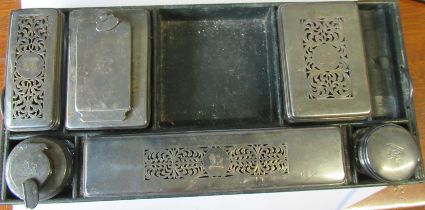 A George IV six piece silver mounted travelling set, in a fitted green leather tray, to include