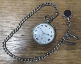 A silver cased open face pocket watch, with silver curb chain and fob