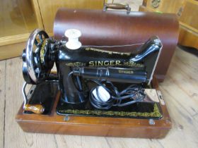 Two Singer sewing machines