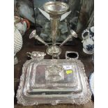 A collection of silver plate to include center pieces, covered tureen and curets