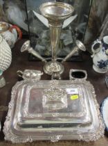 A collection of silver plate to include center pieces, covered tureen and curets