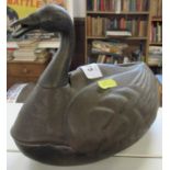 An Eastern metal desk inkwell, formed as a duck, with hinged section to its back