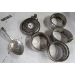 A collection of hallmarked silver to include pocket watch, napkin rings, caddy spoon etc