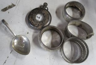 A collection of hallmarked silver to include pocket watch, napkin rings, caddy spoon etc