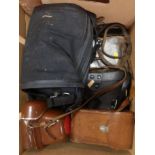 A box of vintage cameras etc