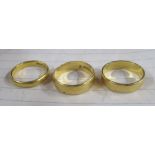 Two 22ct gold wedding bands, weight 9g, together with a 9ct gold band, weight 4.1g