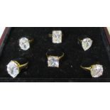Six various gilt metal rings