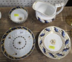 A 19th century tea bowl and saucer, together with a Derby jug and saucer