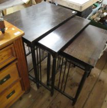 An Arts and Crafts style nest of tables, width 26ins and down, depth 18.5ins, height 28ins and down