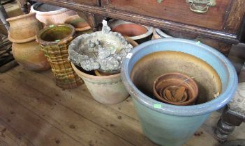 A collection of garden pots, etc