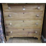 A 19th century chest of four long drawers