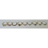 Nine various 9k and other rings, set with various gemstones
