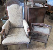 A carved oak framed and upholstered armchair, together with an oak folding cake stand