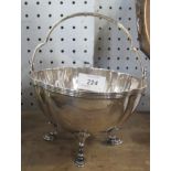 A silver basket, with swing handle, weight 5oz