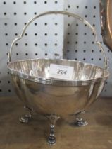 A silver basket, with swing handle, weight 5oz