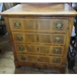 A walnut chest of drawers, width 25.5ins, depth 18ins, height 29ins