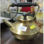 An Arts and Crafts style brass kettle, stamped CDE