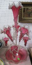 A Victorian cranberry glass epergne - The piece is very dirty. From inspection there are no broken