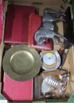 A box of assorted metal ware, cutters, cruet, horse door stop etc