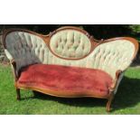 A 19th century showwood spoon back settee