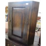 A Heals oak corner cupboard, width 26ins, height 30ins, depth 16.5ins