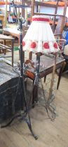 Three wrought iron oil lamp stands, converted to electricity