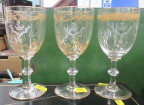 Three drinking glass, each with different gilt decoration and etched with the same crest