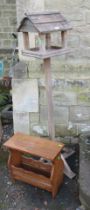 Bird table and a magazine rack and two stone items