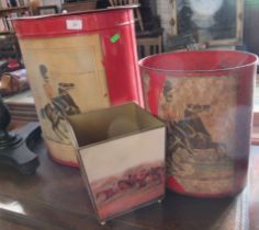 Two red metal bins, one with lid, both with prints of 6th Inniskilling Dragoons, together with
