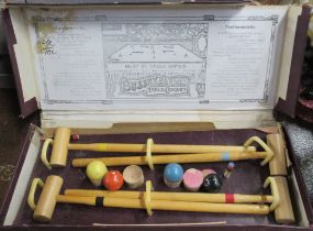 A boxed Bussey's Table Croquet set, with four mallets, balls etc