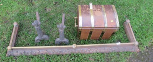 A fire surround, pair of fire dogs and a box