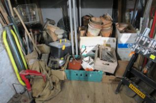 A large collection of tools, garden pots, workmate, pitch forks, steel grills etc