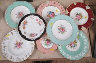 Eight Royal Crown Derby cabinet plates