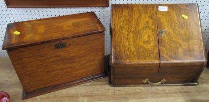 A Steele & Co Birmingham oak stationary box, fitted with compartments and drawers, with fall flap,
