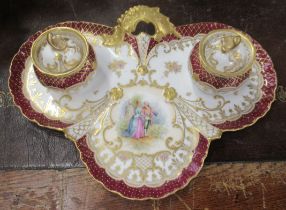 A Dresden porcelain ink stand, with two covered inkwells, decorated with figures - good condition,