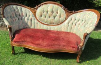 A 19th century showwood spoon back settee