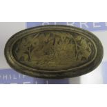 An Antique oval brass snuff box, with engraved decoration, maximum diameter 5ins, height 12.75ins