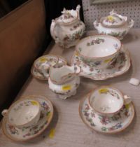 A 19th century part tea service, comprising tea pot, covered sugar bowl, jug, slop bowl, sandwich