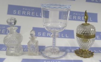 A drinking glass, with blue and white twist cane decoration, height 6.25ins, together with a glass