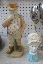 A Royal Worcester figure, John Bull, together with a Royal Worcester candle snuffer, Mop Cap
