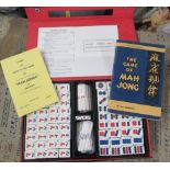 A cased Mah Jong set, together with two holders