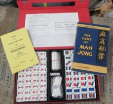 A cased Mah Jong set, together with two holders