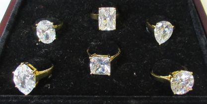 Six various gilt metal rings