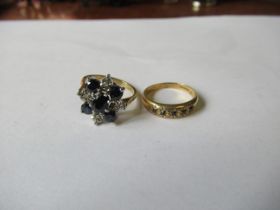 A 9ct gold ring, the five sapphires star gypsy set, together with a 9ct gold ring set with