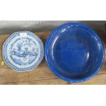 An Oriental blue and white plate, af, diameter 9ins, together with a shallow blue bowl, diameter