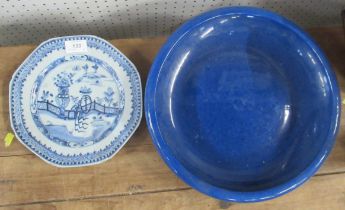 An Oriental blue and white plate, af, diameter 9ins, together with a shallow blue bowl, diameter