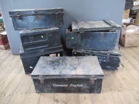 A collection of tin boxes trunks etc