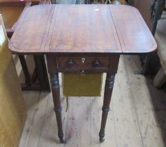 A 19th century mahogany work table, with drop flaps, drawer and material covered basket, on turned